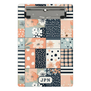Vintage-Patchwork-Blumenquilt in sanfter Pastelltö Mini Klemmbrett