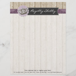 Vintage Queen Crown auf rustikalem Holz und Halbpe Briefbogen