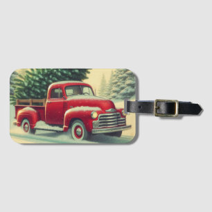 Vintage roter LKW mit Weihnachtsbaum Gepäckanhänger