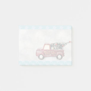 Vintage roter Spielzeug-LKW mit einem Weihnachtsba Post-it Klebezettel