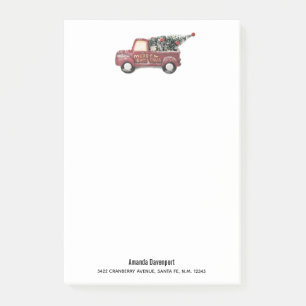 Vintage roter Spielzeug-LKW mit einem Weihnachtsba Post-it Klebezettel