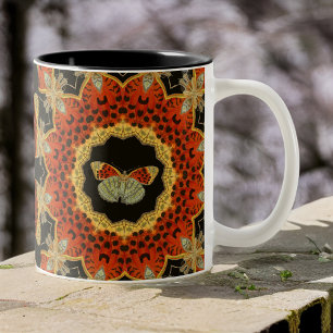 Vintage roter und goldener Nachtfalter im geflügel Zweifarbige Tasse