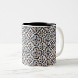 Vintage schwarzes und weißes verziertes Fliesenmus Zweifarbige Tasse