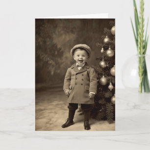 Vintage-Sepia-Weihnachtskarte Retro-Junge Baum Karte