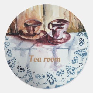 Vintage Teebecher auf der Küchenzeile mit weißer L Runder Aufkleber