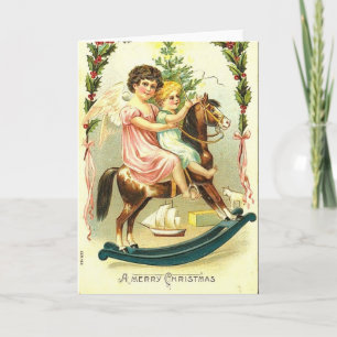 Vintage-Weihnachtscherubim und Schaukelpferd Feiertagskarte