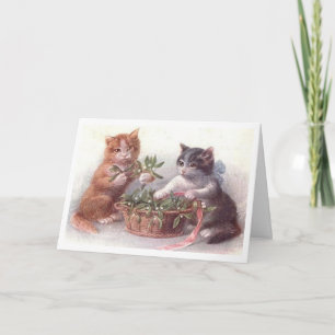 Vintage-Weihnachtskarte mit spielenden Kätzchen Feiertagskarte