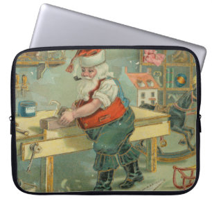 Vintage-Weihnachtskarte - Santa in seiner Werkstat Laptopschutzhülle