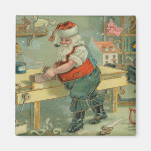 Vintage-Weihnachtskarte - Santa in seiner Werkstat Magnet