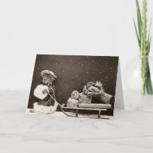 Vintage Weihnachtskatze zieht Geschenkschlitten Fo