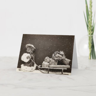 Vintage Weihnachtskatze zieht Geschenkschlitten Fo Feiertagskarte