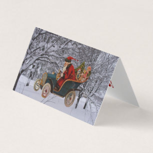 Vintage Weihnachtsmann fährt in einer modernen Sch