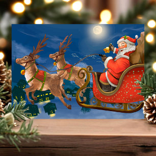 Vintage Weihnachtsmann-Schlitten-Rentier-Feiertags Feiertagspostkarte