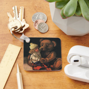 Vintage-Weihnachtsspielzeug, Puppe und ein Teddyb Schlüsselanhänger