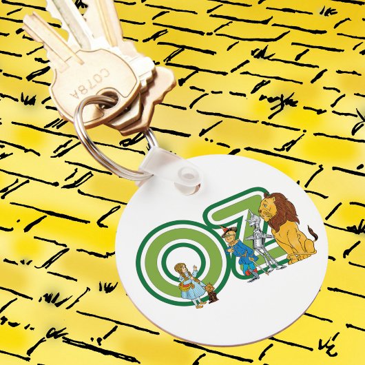 Vintager Assistent für Oz-Zeichen und Textbuchstab Schlüsselanhänger