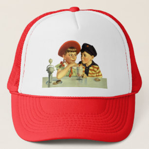 Vintager Junge und Mädchen, die einen Schüttelfros Truckerkappe