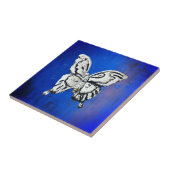 Vintager mexikanischer Silberschmetterling auf bla Fliese (Seite)