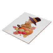 Vintager Pilgrim Boy betet auf Pumpkin Fliese (Seite)