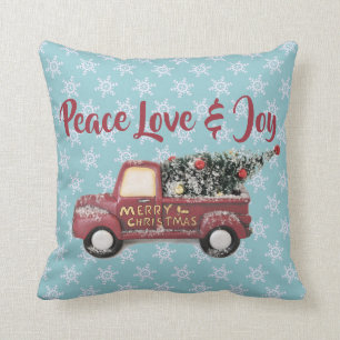 Vintager Red Toy Truck mit einem Weihnachtsbaum Kissen