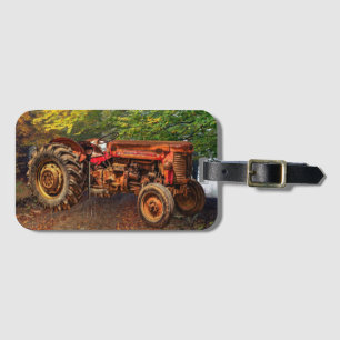 Vintager roter Zuchttraktor Gepäckanhänger