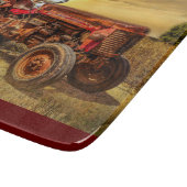 Vintager roter Zuchttraktor Schneidebrett (Ecke)