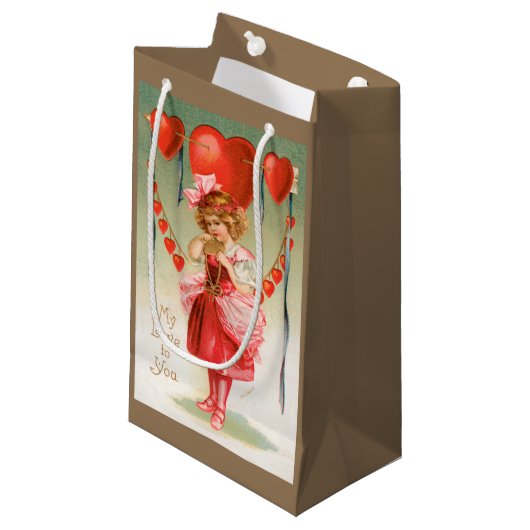 Vintager Valentinstag, Viktorianisches Mädchen mit Kleine Geschenktüte (Vorderseite Schrägansicht)