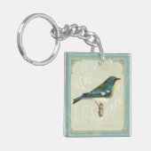 Vintager Vogel, der das Recht gegenüberstellt Schlüsselanhänger (Vorderseite links)