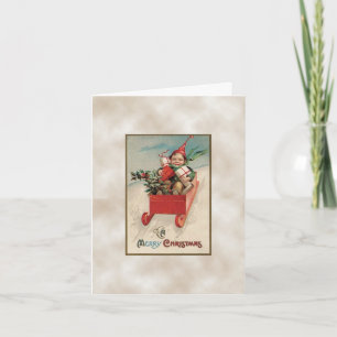 Vintager Weihnachtsjunge auf Schlitten Feiertagskarte