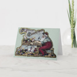 Vintager Weihnachtsmann arbeitet an seinem Schreib Feiertagskarte