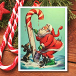 Vintager Weihnachtsmann, der eine Candy Cane gemal Feiertagspostkarte<br><div class="desc">Der Vintage Weihnachtsmann malte eine Bonbons-Cane-Illustration.</div>