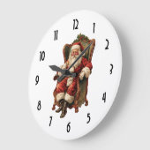 Vintager Weihnachtsmann in einem gemütlichen Stuhl Große Wanduhr (Winkel)