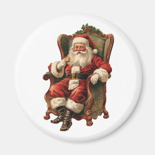 Vintager Weihnachtsmann in einem gemütlichen Stuhl Magnet