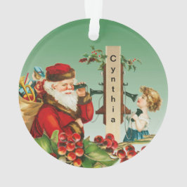 Vintager Weihnachtsmann und Mädchen am Telefon mit Ornament
