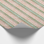 Vintages beunruhigtes rotes grünes Stammes- Geschenkpapier (Ecke)