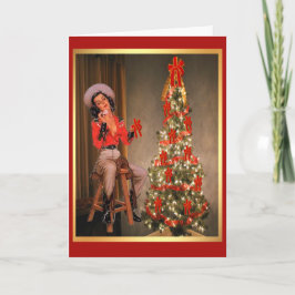 Vintages Cowgirl auf Sattel mit Weihnachtsbaum Feiertagskarte