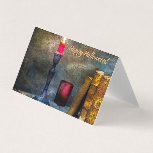 Vintages Glück Halloween Red Candle & Old Books