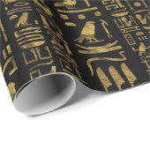 Vintages Gold der ägyptischen Hieroglyphen auf Geschenkpapier (Rolleneckpunkt)