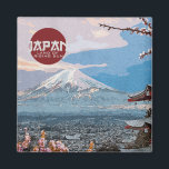 Vintages Japan Fuji Reise Magnet<br><div class="desc">Dieses klassische Vintage Reiseplakat bietet einen spektakulären Blick auf den Fuji durch Kirschblüten. Der Titel lautet: Japan,  Land of Rising Sun. Reisen Sie die Welt,  ohne Ihr Haus verlassen!</div>