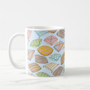 Vintages nahtloses Muster mit bunten Kissen. Te Kaffeetasse