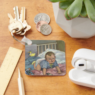 Vintages Niedliches Baby-Spielen in der Kinderkrip Schlüsselanhänger