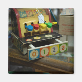 Vintages Spielzeugregister Magnet