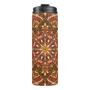 Vintages verziertes Muster mit Blumenelementen. Or Thermosbecher