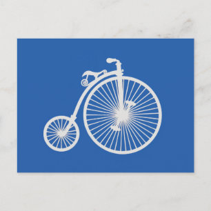 Vintages weißes Fahrrad auf blau Postkarte