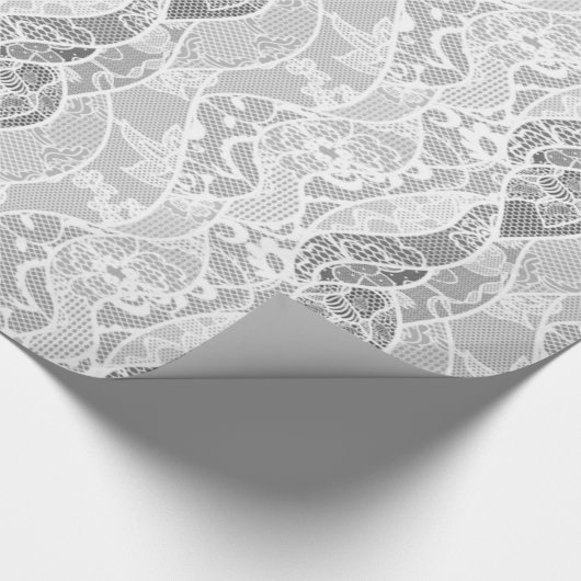 Vintages weißes graues französisches Spitzemit Geschenkpapier (Ecke)