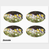 Violas in einem Steintrog. Ovaler Aufkleber (Blatt)
