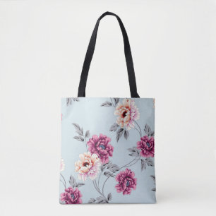 violette und gelbe Blumen mit Blätter auf b Tasche