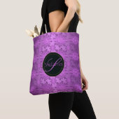 Violettes mit Blumenmuster. Monogramm Tasche (Von Nahem)