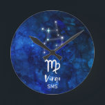 Virgo Zodiac Constellation Blue Galaxy Monogram Runde Wanduhr<br><div class="desc">Virgo Zodiac Constellation Blue Galaxy Monogram Design With trendy Brushed Script Font, Dark blue celestial watercolor background texture, Glowing star constellation, and The Maiden symbol. Modern Astrological Sign Birth Horoscope, is perfect for any Virgo Birthday From August 23 - September 22 ! With Optional Monogrammed First Middle and Last name...</div>