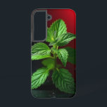 "Vivid Mint Pflanze Macro - Botanisches Grün auf S Samsung Galaxy Hülle<br><div class="desc">Mit diesem lebhaften Makrofoto einer minten Pflanze lassen Sie sich von Frische und Eleganz der Natur verzaubern. Das in atemberaubenden Details eingefangene, knusprige Grün verlasst einen Pop dramatisch vor einem launenhaften schwarzen Hintergrund mit einem auffallenden roten Farbverlauf. Ideal für Küchendekoration, Kräutergeschenke, botanische Liebhaber oder alle, die die Schönheit der Natur...</div>