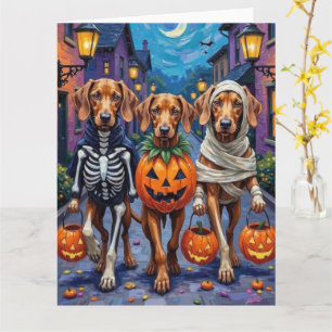 Vizsla-Hunde beim Trick-or-Treat in Halloween-Kost Karte